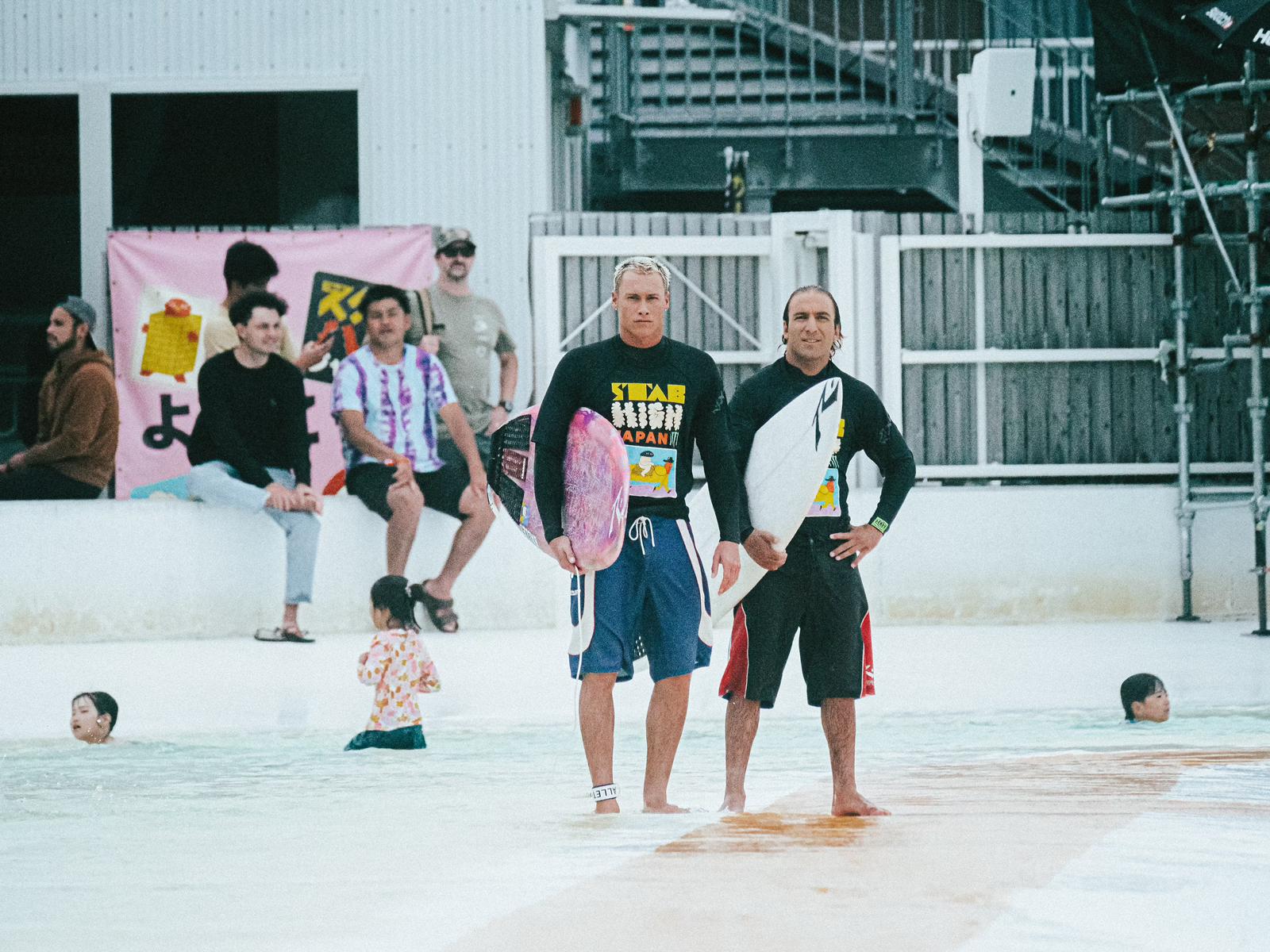 Stab High 2024 Recap - Letty & Zeke standing with their Rusty Surfboards